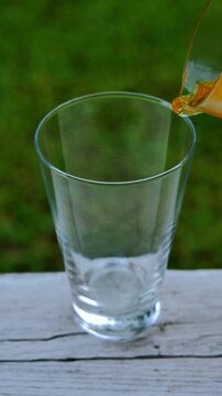 Pouring Orange Juice into a Glass	