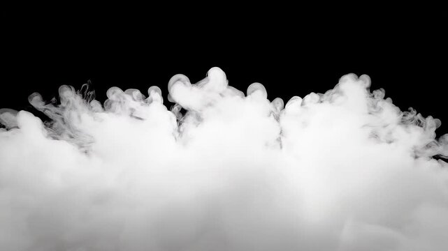 White fluffy clouds isolated on black background for compositing and design overlays.