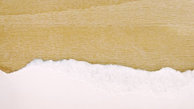 Torn White Paper Edge on Light Wooden Background. banner with Copyspace for scrapbooking, collages, and craft design templates