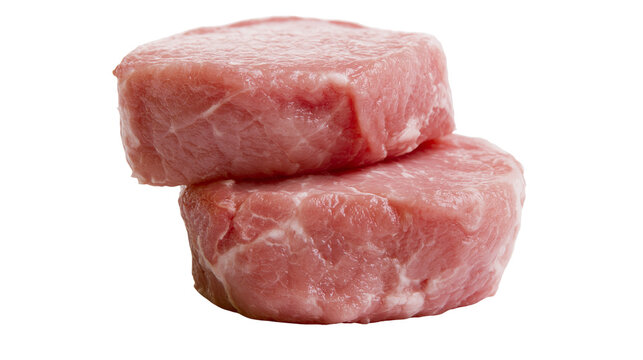 Two raw fresh pork tenderloin medallions stacked on top of each other