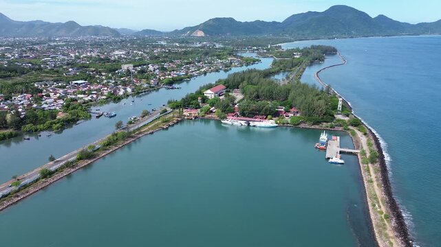 Aerial view of Banda Aceh city at the morning. Showing Ulee Lheue port and beautiful ocean and mountain.
