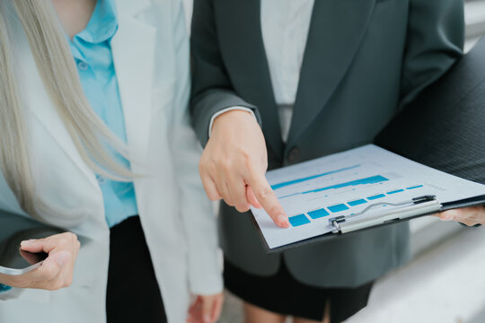 Professional teamwork business people working together focus on chart analysis with positive emotion and successful corporate strategy