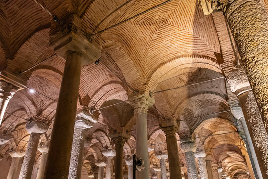 Ancient underground cistern with stone columns and elaborate brickwork architecture