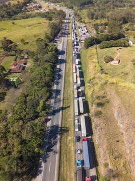 Aerial view of trucks in a heavy traffic on a highway