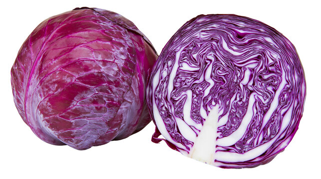 Whole and halved fresh red cabbage heads with visible purple leaves and white veins