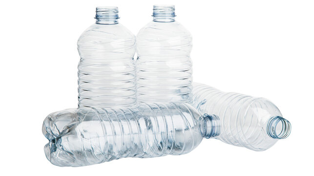 Empty clear plastic water bottles with ribbed texture and screw caps