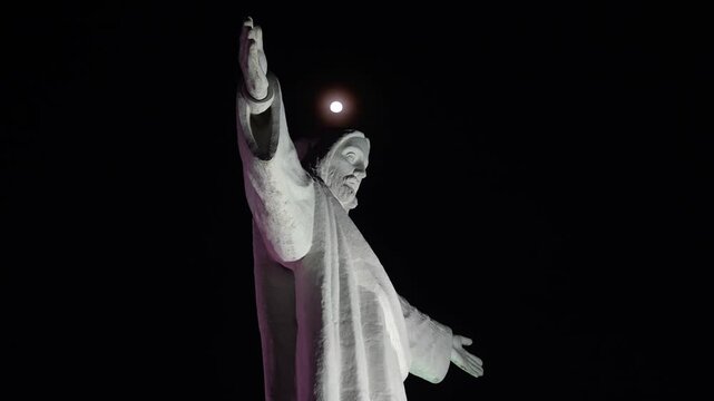 Cristo Blanco Jesus White Christ arms wide open with Full Moon statue Cusco vive en Peru Per&uacute; nighttime Cuzco Red Hill Saqsaywaman Peruvian Andes landscape rainy season sunset Inca Empire capitol