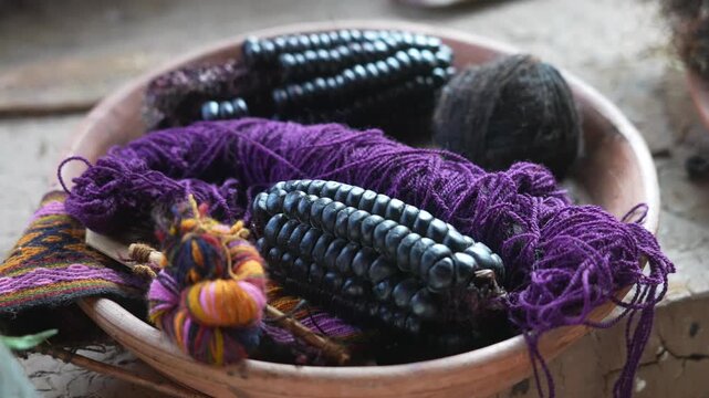 Blue corn Peruvian Alpaca llamas natural dye purple wool pots textile City of Cuzco Cusco Awana Kancha Peru rainy season morning Peruvian Andes Anta Province Plaza de Armas Saqsaywaman Inca Temple