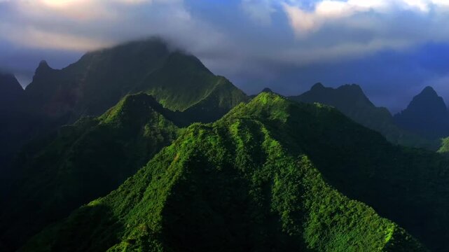 Tahiti Ito Volcano Towering mountains peaks of Teahupo'o ridges South Pacific Island French Polynesia aerial drone sunset clouds Tara Huhurahi Mount Ronui Aorai Orohena Vaiau River Valley circle right