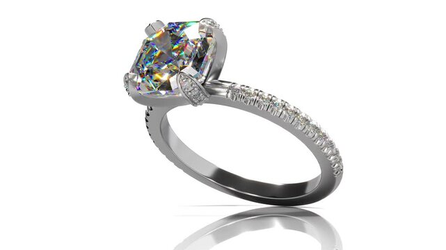 Rotation of realistic engagement ring with large radiant cut diamond on white background. 3d animation loop