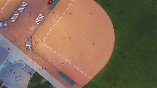 City of Golden Ulysses Sports Complex baseball softball diamond sports fields aerial drone birdseye view players playing summer dusk evening under the lights Golden Colorado upwards motion