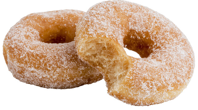 Two golden brown sugar coated ring donuts with a bite taken out of one