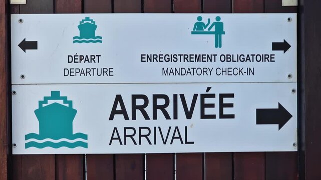 Ferry Terminal on Saint Barthelemy Island, Sign With Directions for Departure and Arrival, Close Up