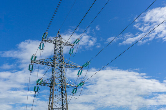 Electricity pylon connecting power lines to transmit energy