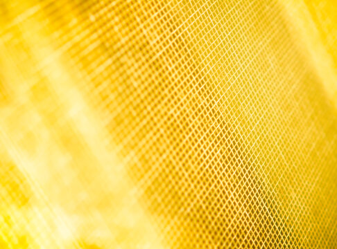 Abstract grid illuminated by warm light background
