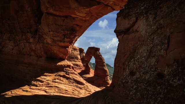 Natural frame time lapse at Delicate Arch under moving clouds in Arches National Park, Utah, USA.
