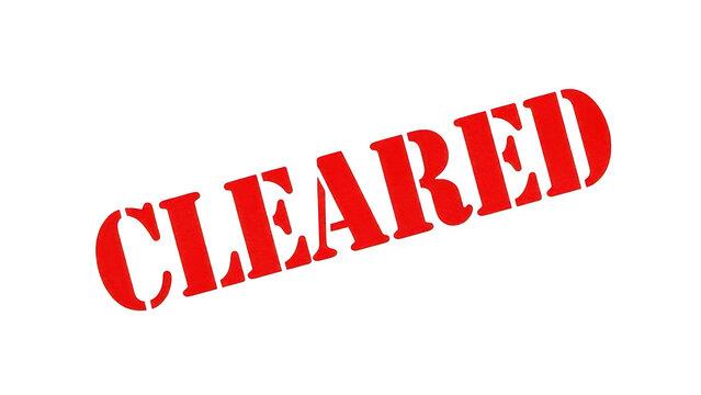 Red rubber stamp impression with the word cleared on transparent background