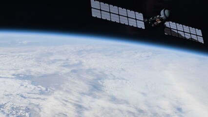 Solar powered satellite hovering over the planet Earth. Collecting data for weather forecasting or providing communications. NASA public domain imagery © Marcin Janiec