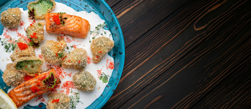 Grilled salmon with breaded broccoli balls