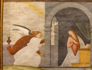 Naklejka premium VERCELLI, ITALY - JANUARY 16, 2026: The renaissance fresco of Annunciation - in the church Chiesa di San Cristoforo by Gaudenzio Ferrari (1529 - 1534).