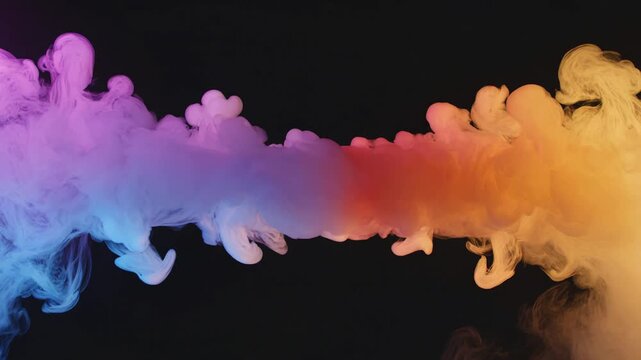 Multicolored ink smoke cloud abstract in purple blue red and orange on black background