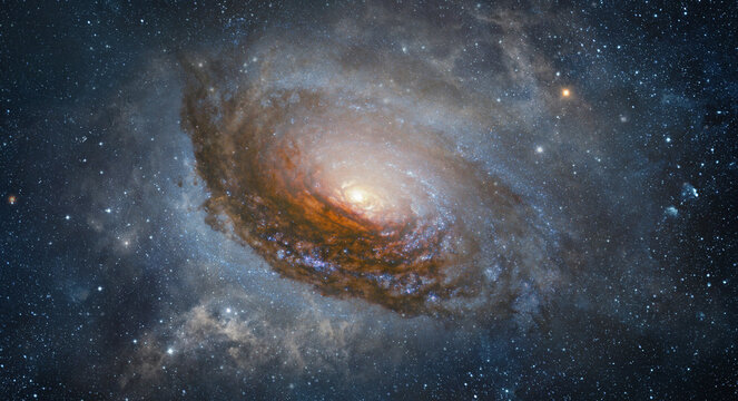 Spiral galaxy in deep space surrounded by stars and cosmic dust.  Elements of this image furnished by NASA.