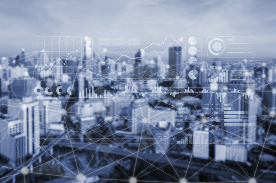 A stunning view of an urban skyline overlaid with digital data visualizations, showcasing trends in finance and technology. Perfect for concepts of modern development. Scalp