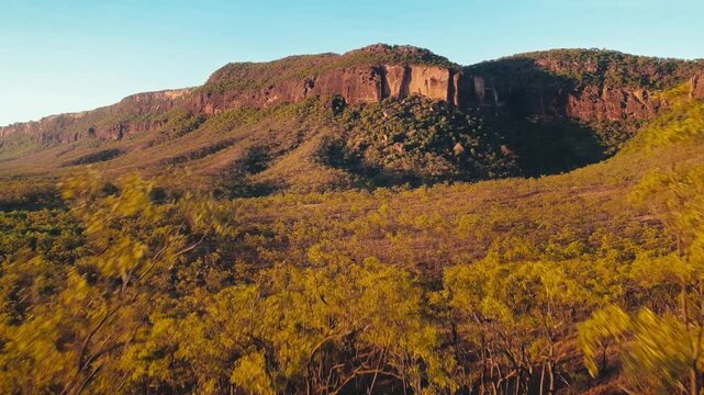 Drone view of Mount Mulligan cliffs at golden hour in Australia