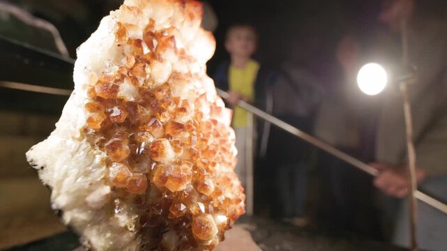 Citrine crystal geode on display inside cave