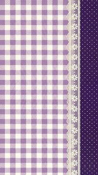 Purple gingham fabric background with floral lace border and polka dot pattern
