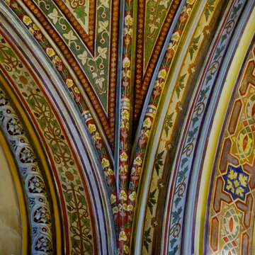 Ornate painted vaulted ceiling with decorative ribs