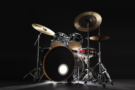 Drum set on black background. Musical instrument