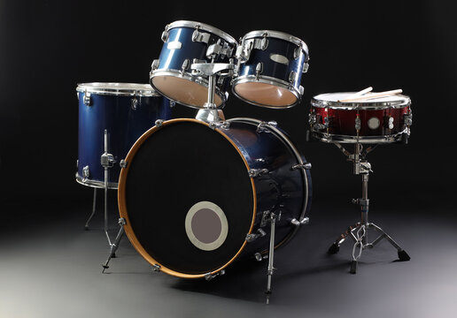 Drum set on black background. Musical instrument