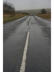 Obraz premium road across the moorland 