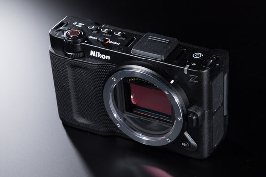Milan, Italy - August 31, 2026: studio shot of a Nikon ZR resting on a black background.