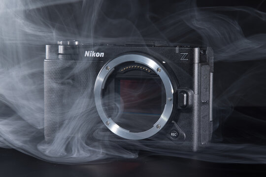 Milan, Italy - August 31, 2026: studio shot of a Nikon ZR resting on a black background.