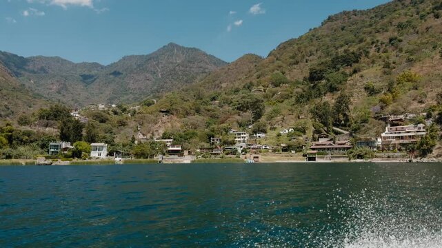 View from a lancha (boat) riding through lake Atitl&aacute;n, Guatemala