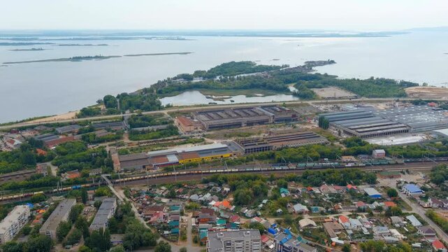 Syzran, Russia. Industrial area with a railway. Panoramic view of the city and the Volga river. Sovetskaya Street. Drone footage