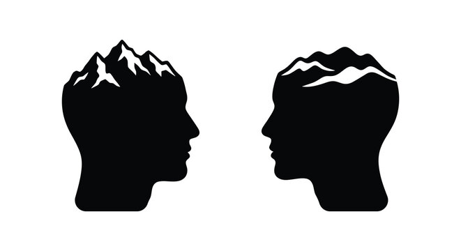Two human head silhouettes contain mountain range landscapes within their profiles