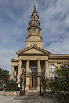 View of the historic St. Philip's Church with its prominent steeple and classical columns in Charleston, South Carolina, United States.