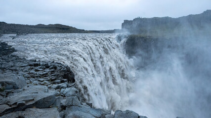 Breathtaking cinematic view of Dettifoss waterfall in North Iceland, one of Europes most powerful waterfalls and a famous film location. © Asanee