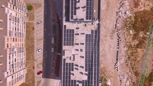 Aerial Top Down View of Solar Panels on Residential Building Rooftops in Nova Vogosca Bosnia and Herzegovina