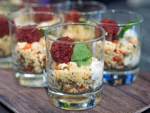 Gourmet Appetizer Display of Couscous with Herb Garnish