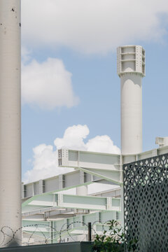 View of the modern steel structural beams and ventilation stacks at Tirana International Airport in Rinas, Albania.