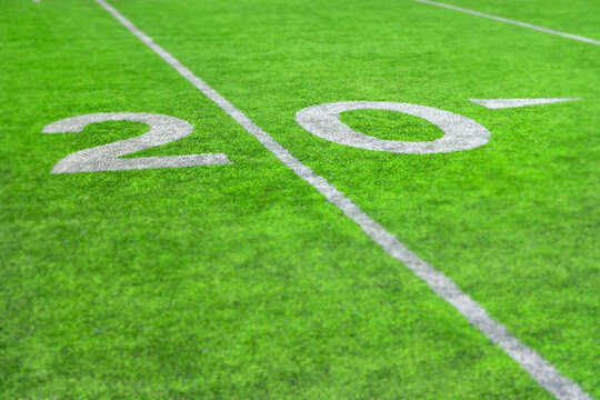 Football Field with Yardage Markers on Turf for Competition and Entertainment