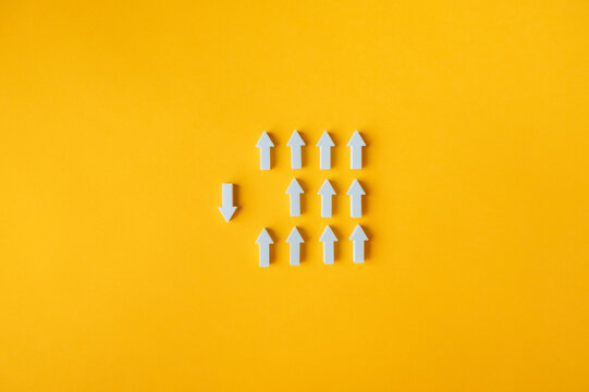 Different direction, independent thinking and standing out from the crowd concept