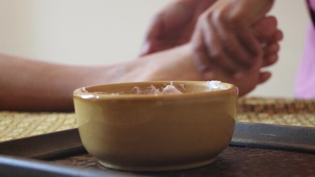 A traditional Thai massage with cosmetic body scrub cream
