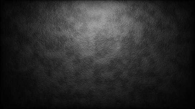 Dark charcoal plaster concrete wall with gritty texture and soft light sweep loop 4k
