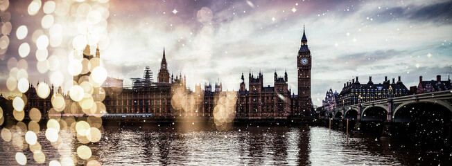 Naklejka premium holiday lights and snowfall in London