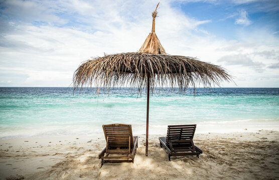 beach chairs on beautiful tropical beach